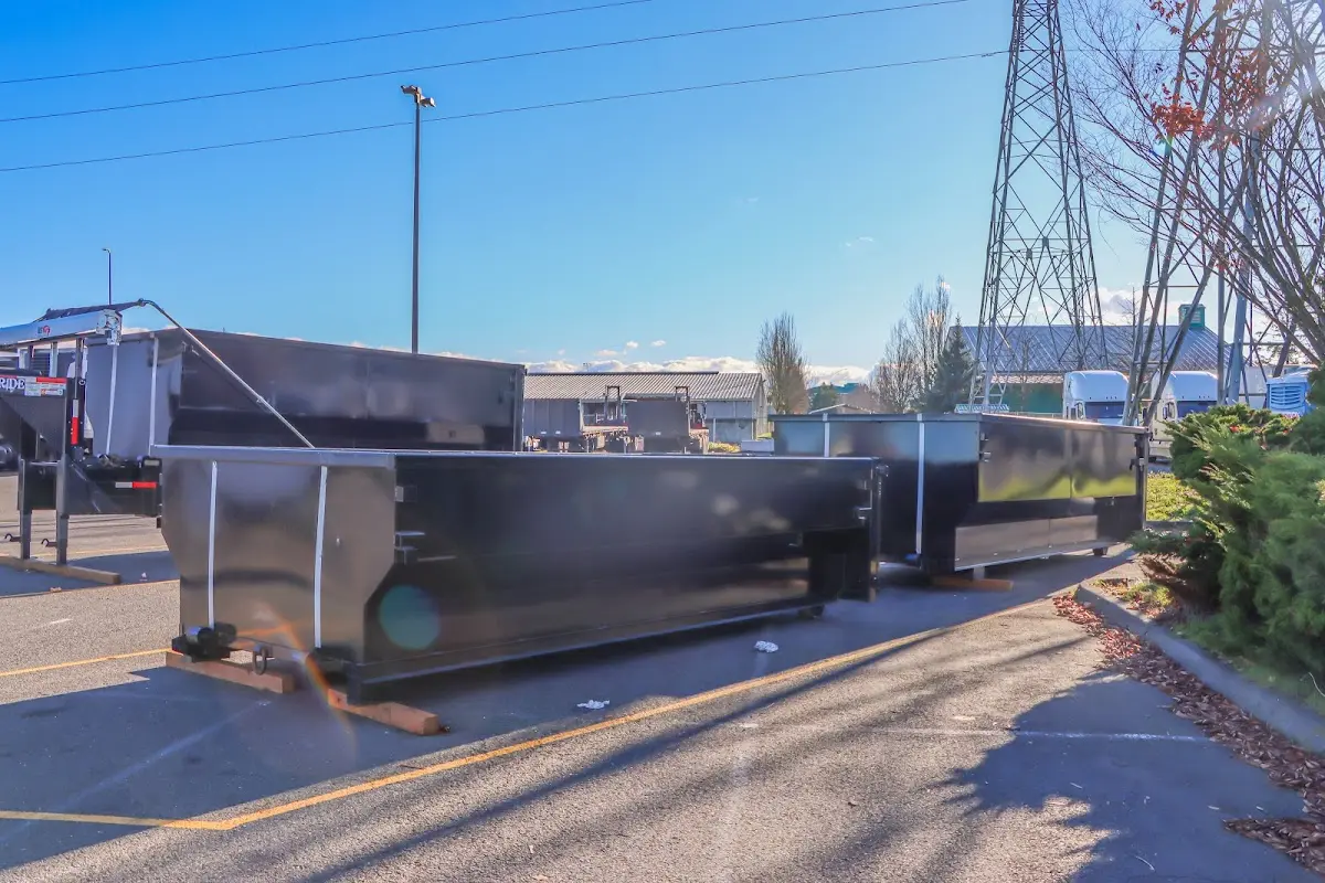 Roll-off dumpster ready for waste disposal at job site for 4 Yard Dumpster Rental in Bethany